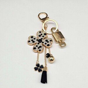 Authentic Louis Vuitton Lock & Key with unbranded Flower Bagcharm, Keycharm
